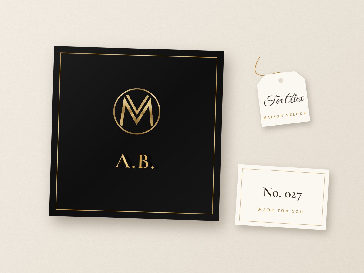 Gift box with gold-foiled initials, name tag and numbered card